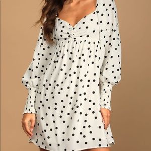Adorable! Mini long sleeve dress. Wore once on my honeymoon.